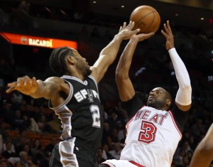 Dwyane Wade of the Miami Heat shoots over Kawhi Leonard of the San Antonio Spurs in the fourth quarter at AmericanAirlines Arena in Miami on Tuesday, February 9, 2016. Pedro Portal pportal@elnuevoherald.com