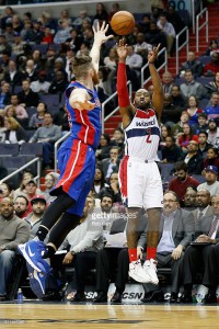 John Wall #2 of the Washington Wizards shoots over Aron Baynes #12 of the Detroit Pistons in the second half of the Wizards 98-86 win at Verizon Center on February 19, 2016 in Washington, DC. February 19, 2016| Credit: Rob Carr