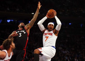 Carmelo Anthony of the New York Knicks controls the ball in the first half against James Johnson of the Toronto Raptors at Madison Square Garden on Monday, Feb. 22, 2016. (Credit: Jim McIsaac)
