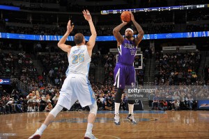 DeMarcus Cousins #15 of the Sacramento Kings shoots the ball against the Denver Nuggets on February 23, 2014 at the Pepsi Center in Denver, Colorado. Credit: Bart Young