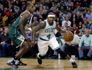 Boston Celtics guard Isaiah Thomas (4) drives against Milwaukee Bucks guard Khris Middleton (22) in the first quarter of an NBA basketball game, Thursday, Feb. 25, 2016, in Boston. (AP Photo/Elise Amendola)