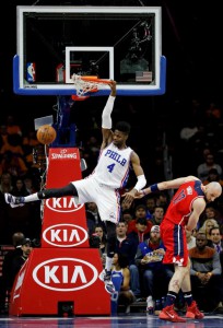 Philadelphia 76ers' Nerlens Noel, left, dunks past Washington Wizards' Marcin Gortat during the first half of an NBA basketball game Friday, Feb. 26, 2016, in Philadelphia. Photo: Matt Slocum, AP 