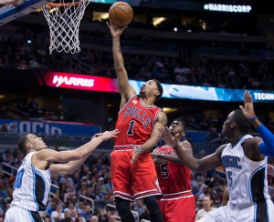 Photo: Willie J. Allen, Jr., AP  Chicago Bulls guard Derrick Rose (1) lays the ball up on Orlando Magic forward Aaron Gordon (00) and guard Victor Oladipo (5) during the first half of an NBA basketball game, Wednesday, March 2, 2016, in Orlando, Fla.