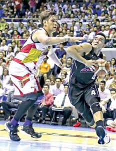 San Miguel Beer’s June Mar Fajardo (left), who is guarding Alaska’s Vic Manuel, may miss their game against the Aces tomorrow after suffering a knee injury during the team’s game against Rain or Shine. (Ernie Sarmiento) 