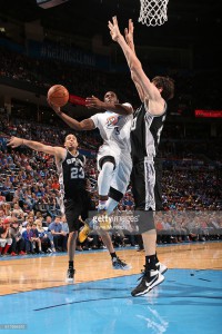 Dion Waiters #3 of the Oklahoma City Thunder goes for the lay up against the San Antonio Spurs during the game on March 26, 2016 at Chesapeake Energy Arena in Oklahoma City, Oklahoma. March 26, 2016| Credit: Layne Murdoch