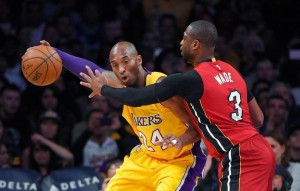 Miami Heat guard Dwyane Wade, right, puts pressure on Los Angeles Lakers forward Kobe Bryant during the first half of an NBA basketball game, Wednesday, March 30, 2016, in Los Angeles. Mark J. Terrill AP 