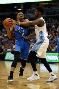 Getty/AFP / Doug Pensinger Oklahoma City Thunder’s Russell Westbrook drives to the basket against Denver Nuggets’ Emmanuel Mudiay during their game at Pepsi Center on April 5, 2016