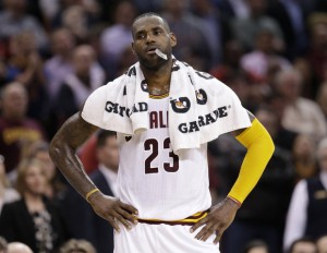 Cleveland Cavaliers' LeBron James waits during a timeout in the final minute of the second half of an NBA basketball game against the Memphis Grizzlies, Monday, March 7, 2016, in Cleveland. The Grizzlies won 106-103. (Tony Dejak/AP)