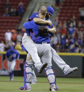 Jake Arrieta (left) celebrates with catcher David Ross after the final out of his no-hitter. (AP) 